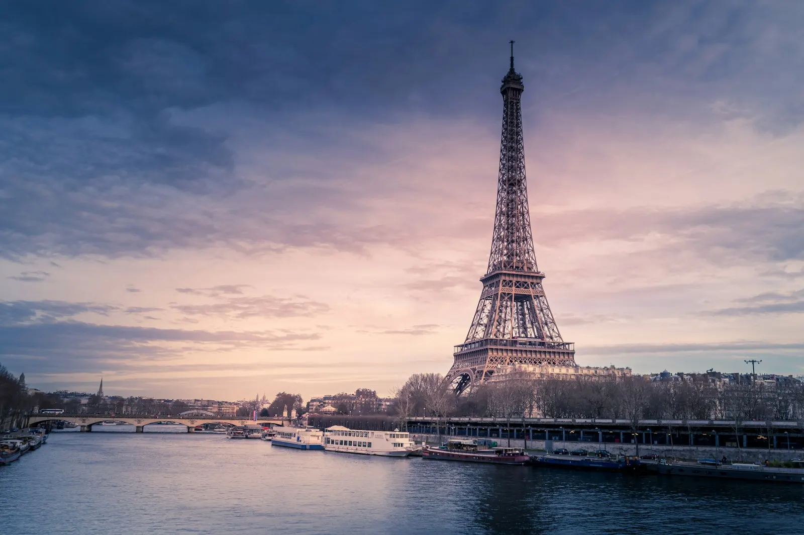 Eiffel Tower above the Seine at dusk