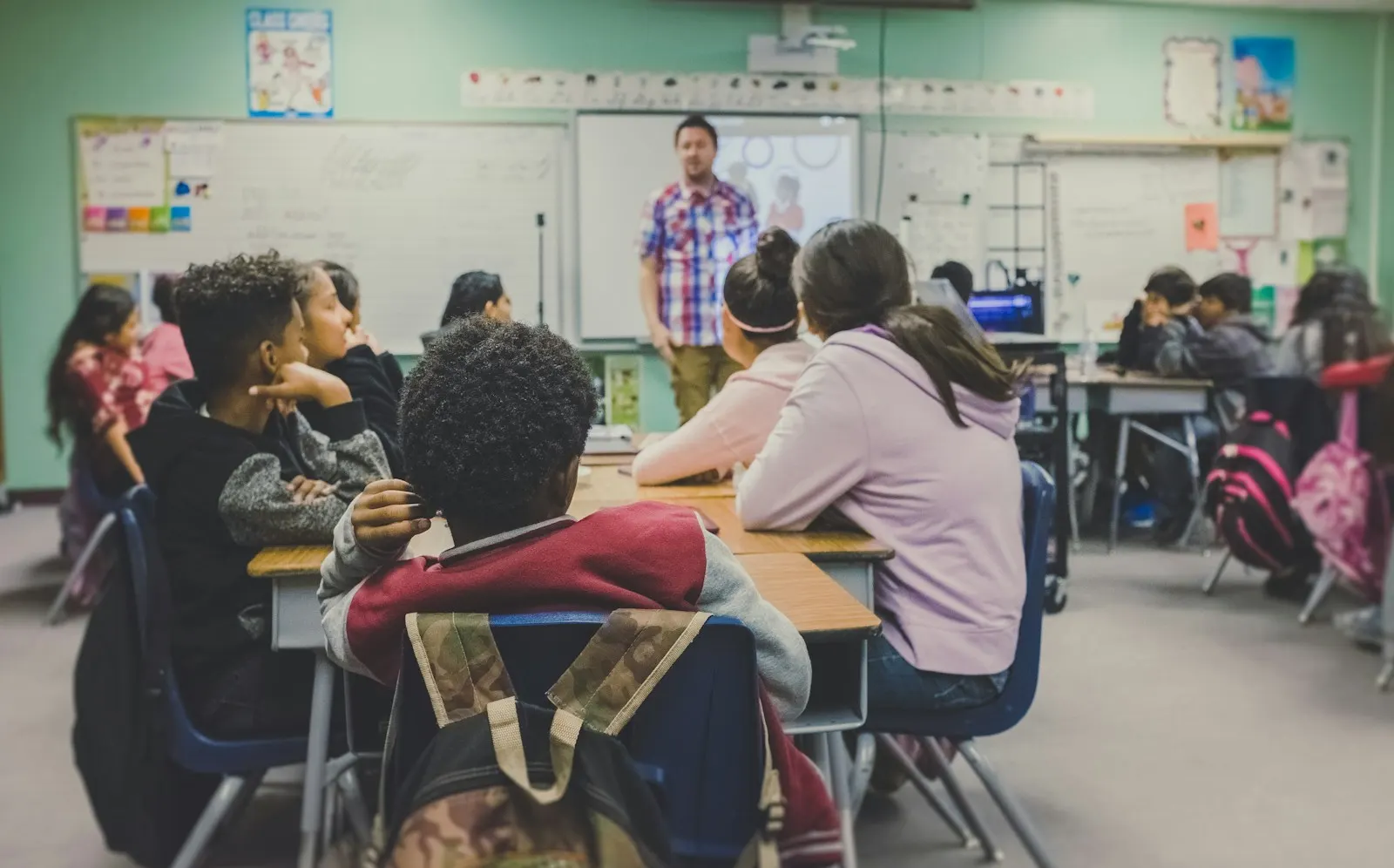 Teacher and pupils in a classroom