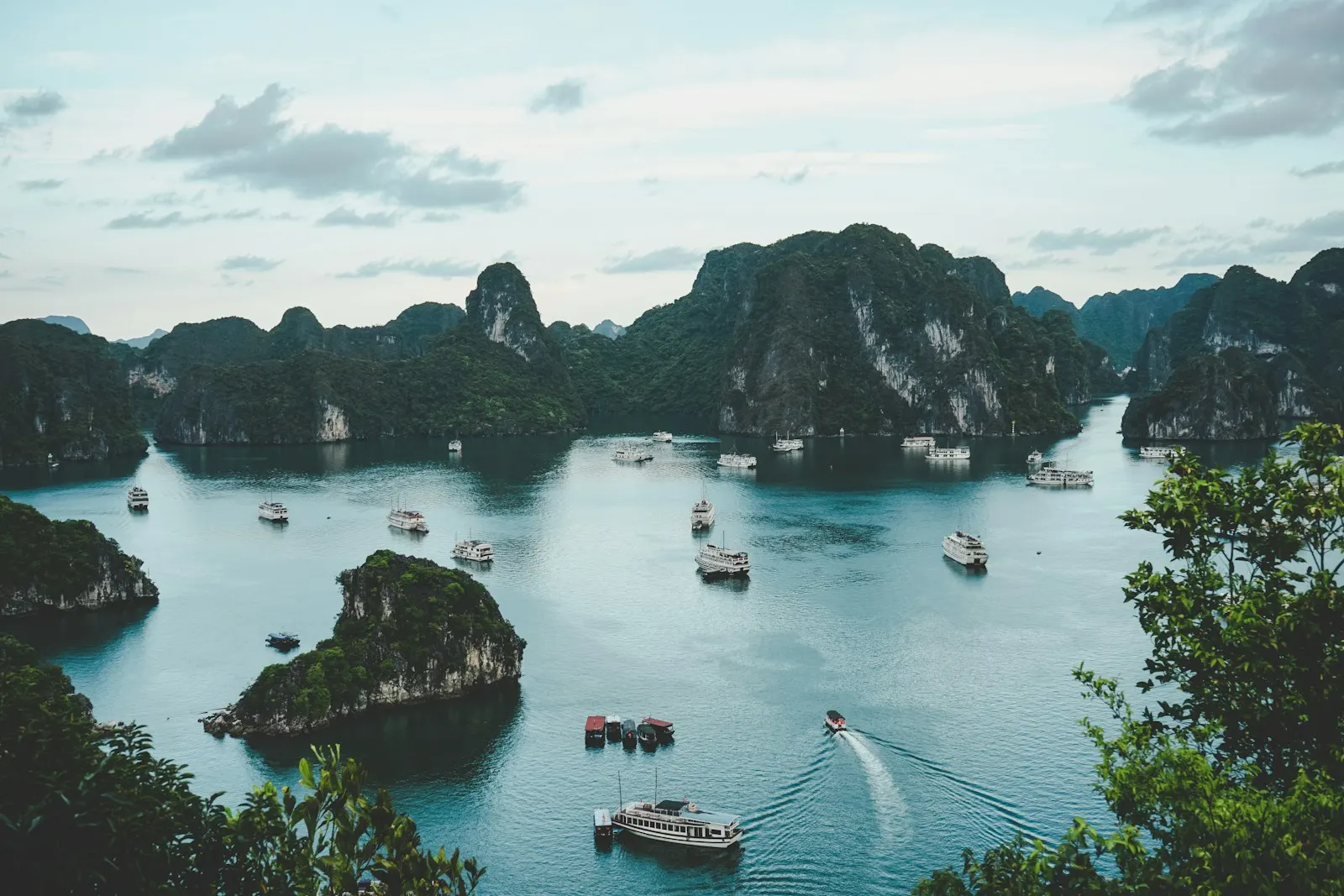 Boats among green islands in a bay