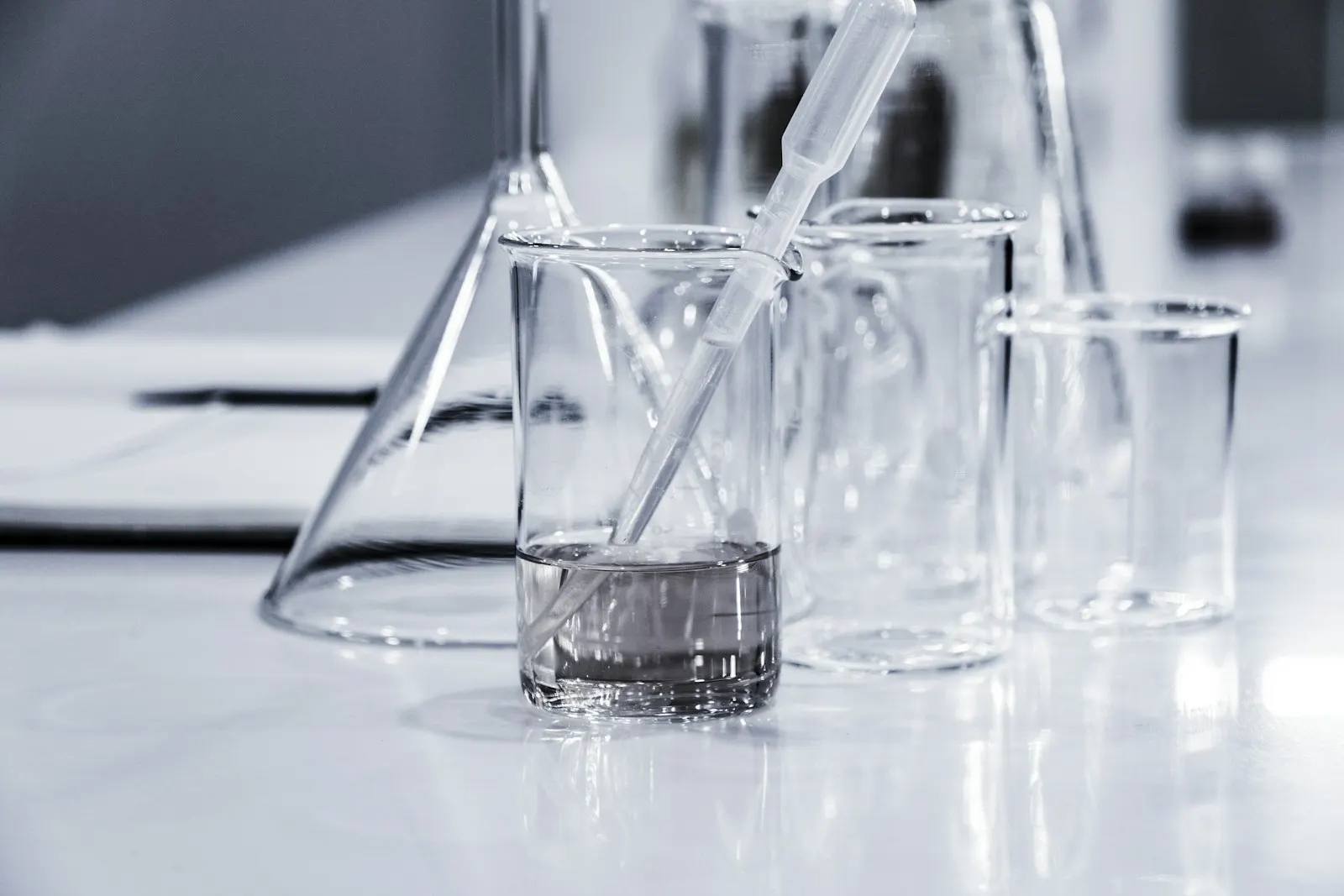 Glass laboratory vessels on a workbench