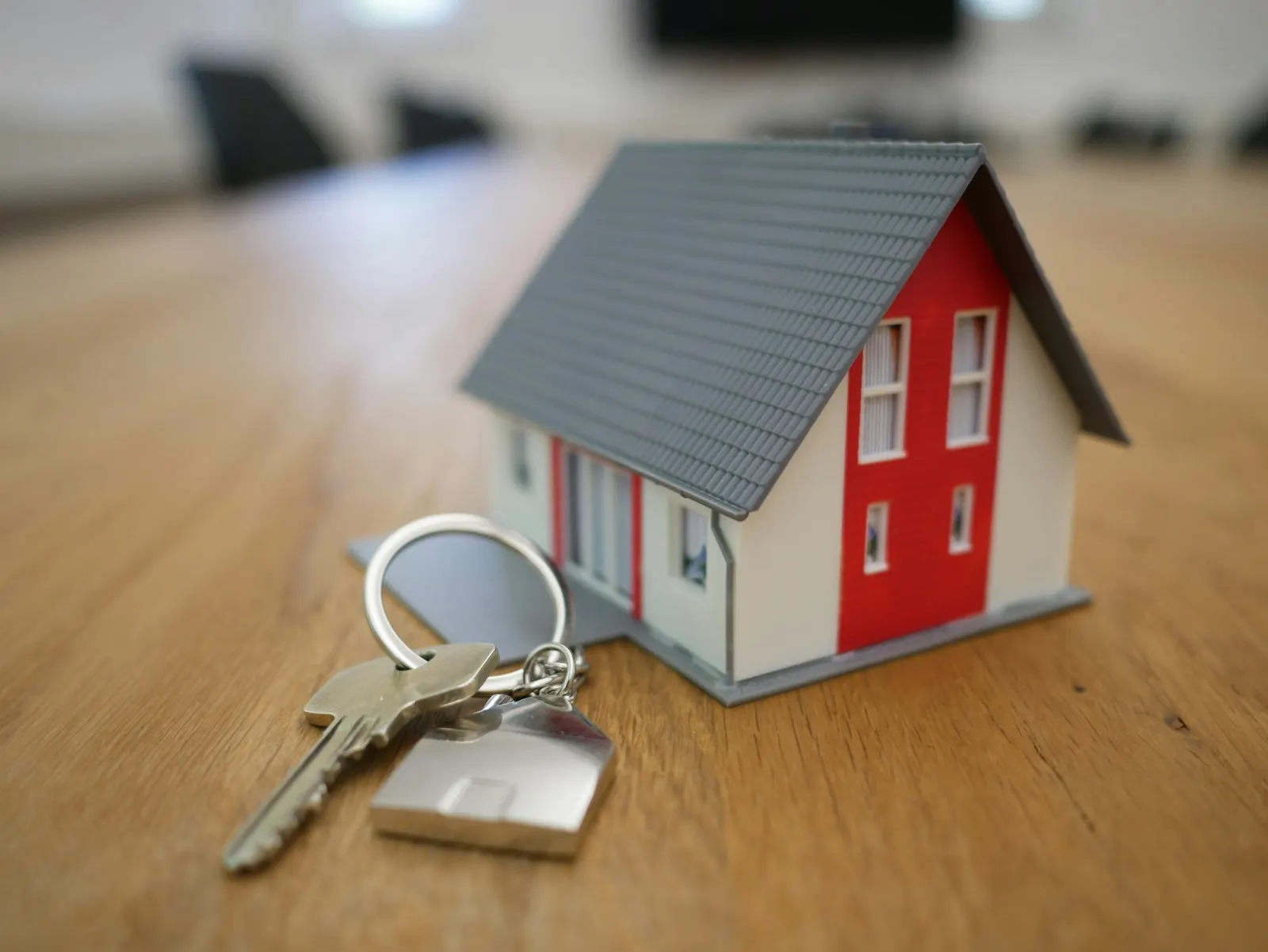 Model house beside keys